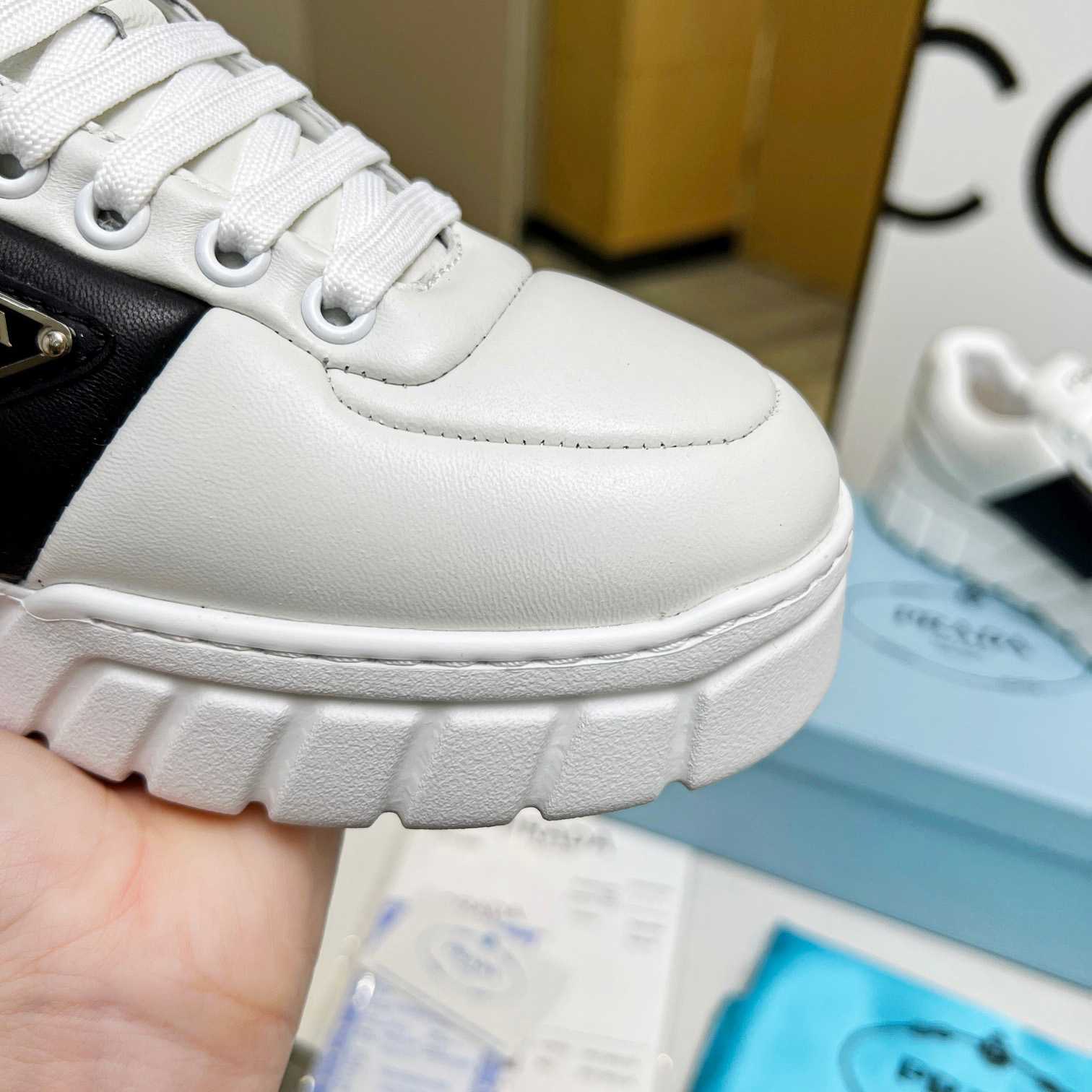 Prada Padded Nappa Leather Sneakers - DesignerGu