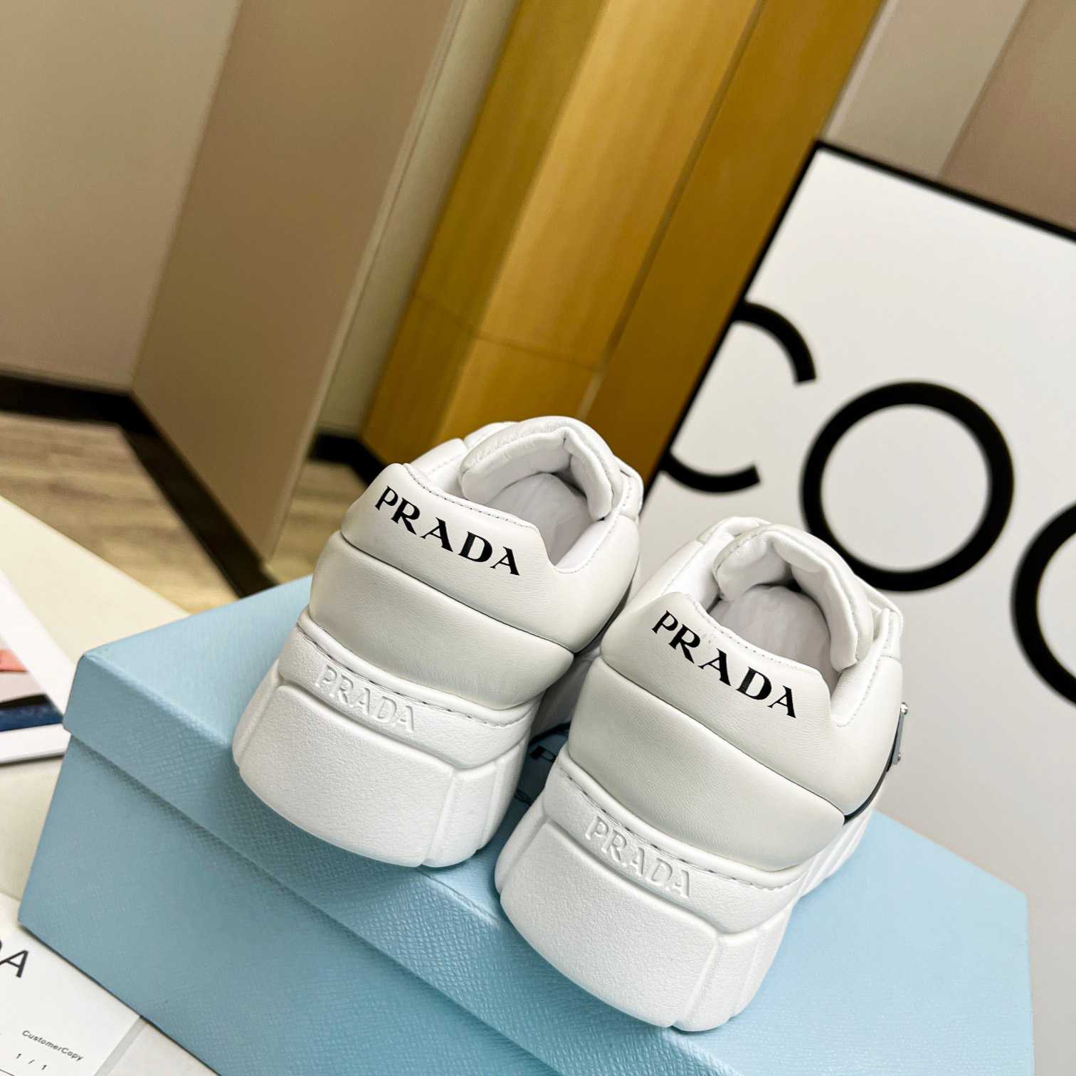 Prada Padded Nappa Leather Sneakers - DesignerGu