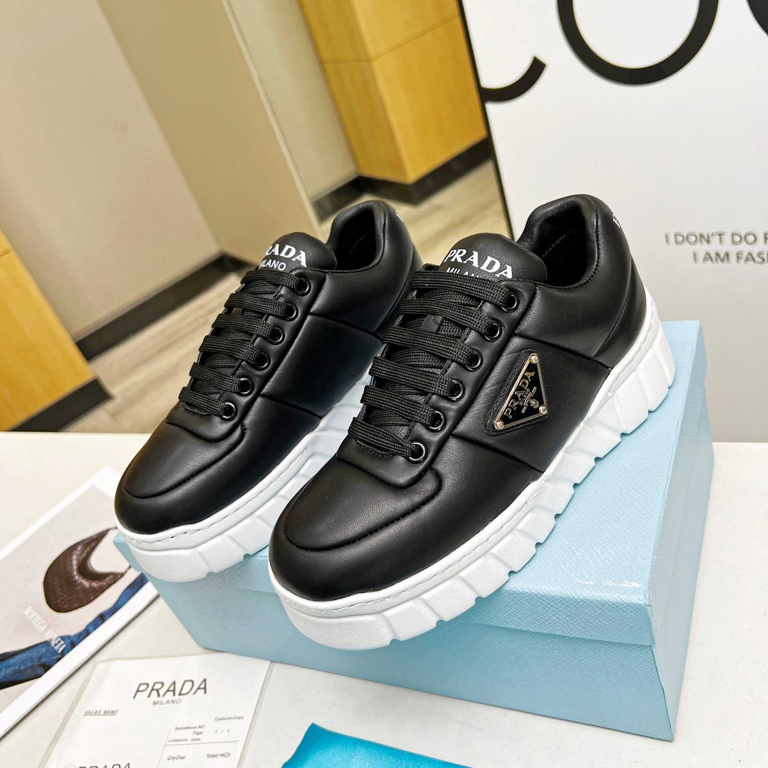 Prada Padded Nappa Leather Sneakers - DesignerGu