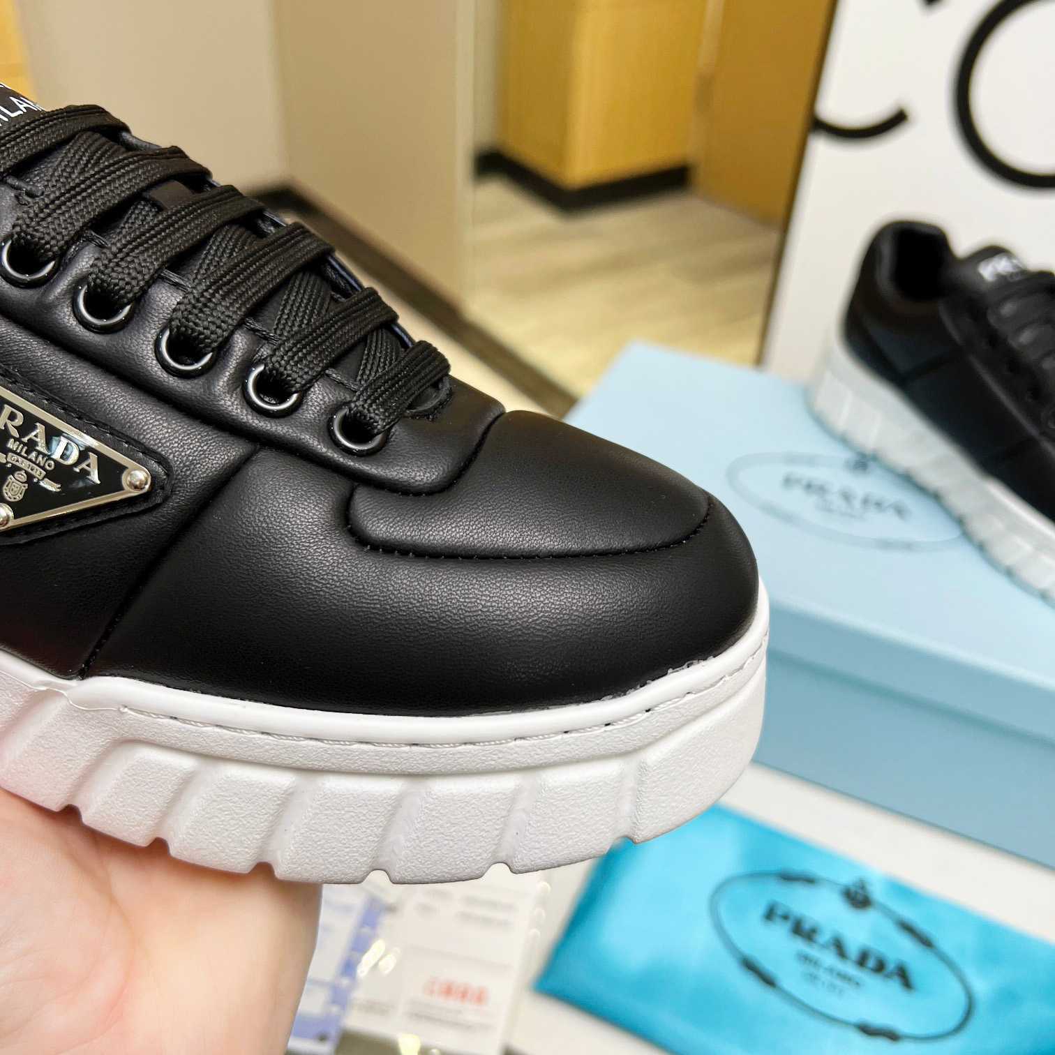 Prada Padded Nappa Leather Sneakers - DesignerGu