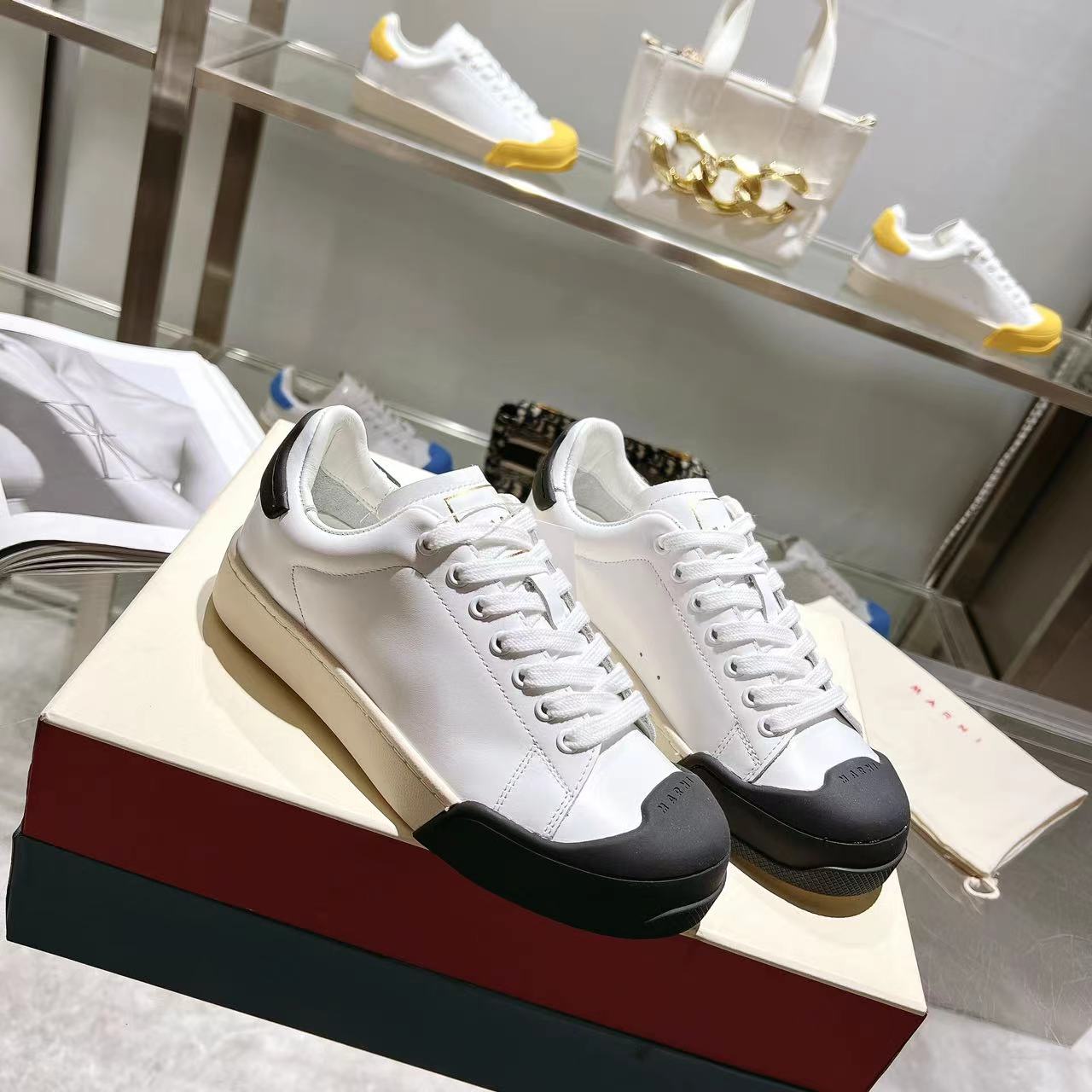 Marni Dada Bumper Sneaker In White And Black Leather - DesignerGu