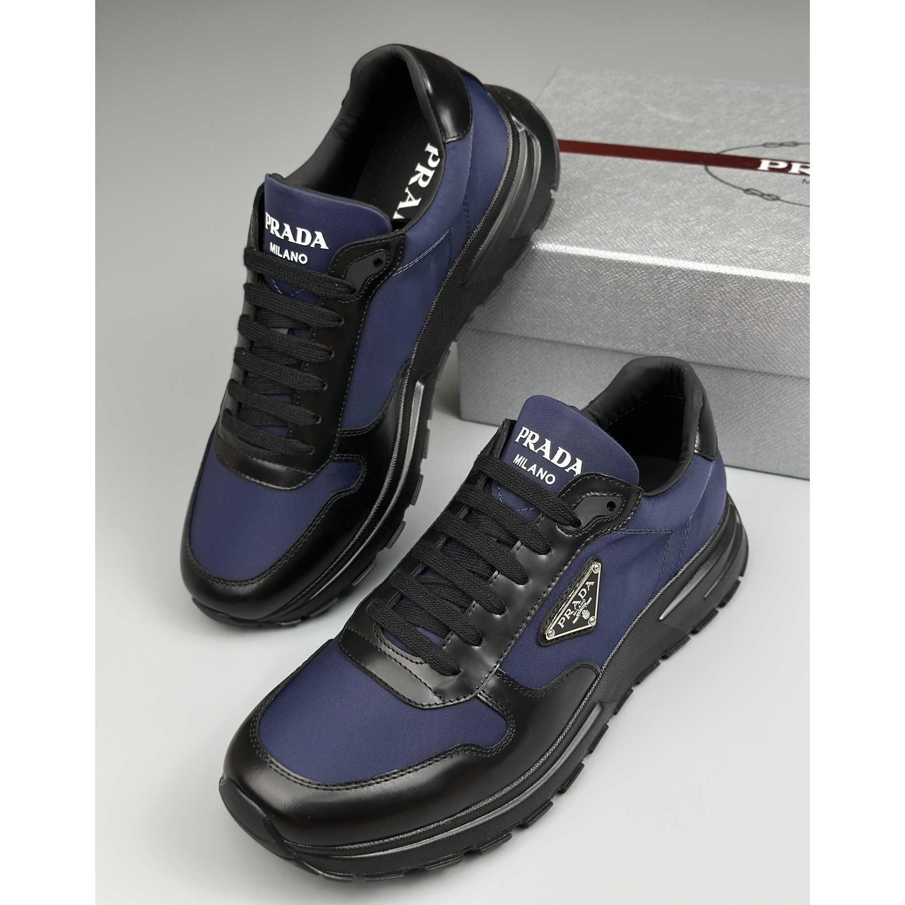 Prada Re-Nylon And Brushed Leather Sneakers - DesignerGu