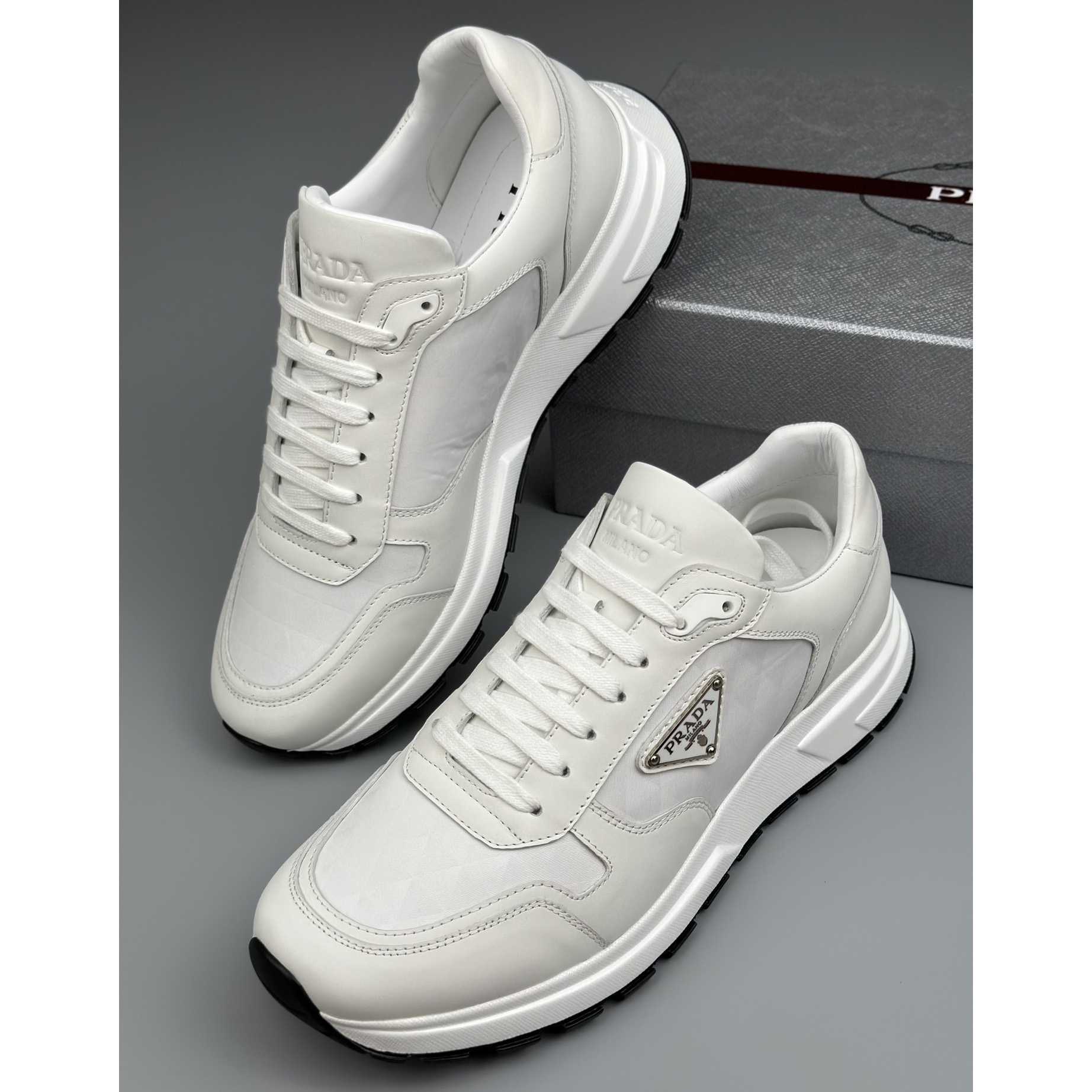 Prada Leather And Re-Nylon High-top Sneakers - DesignerGu