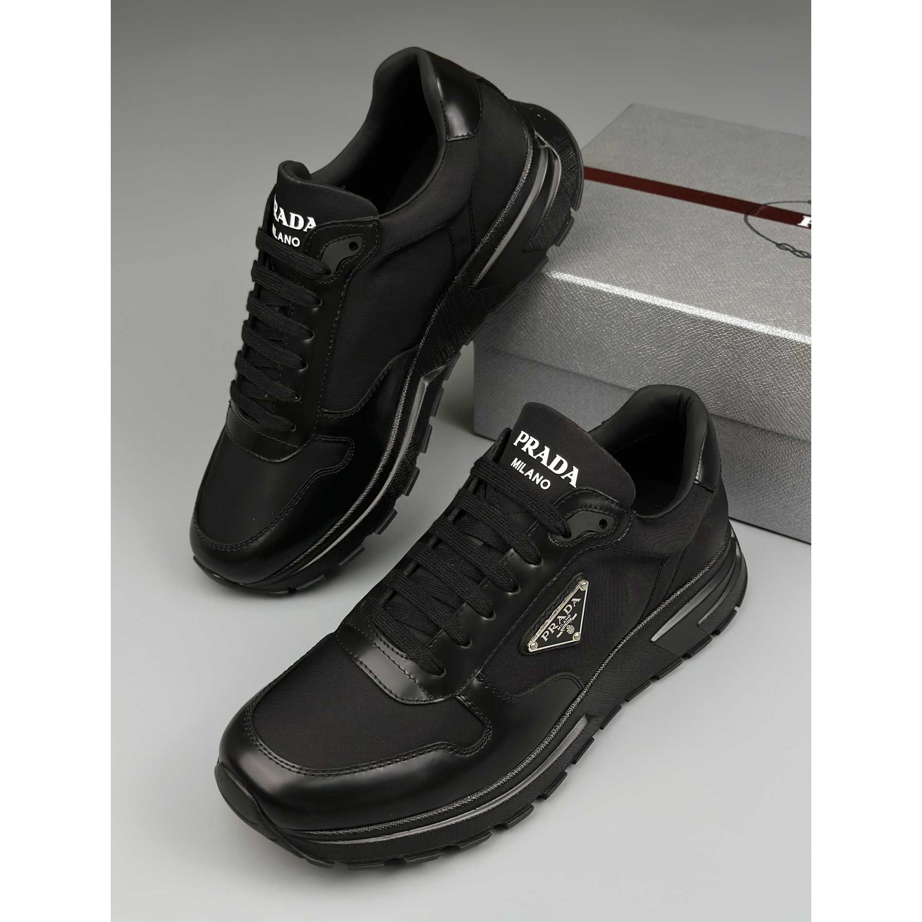 Prada Re-Nylon And Brushed Leather Sneakers - DesignerGu