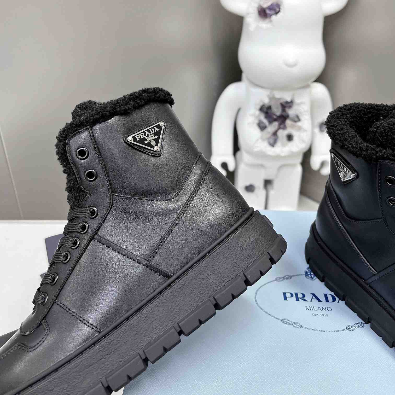 Prada Leather And Shearling High-top Sneakers - DesignerGu