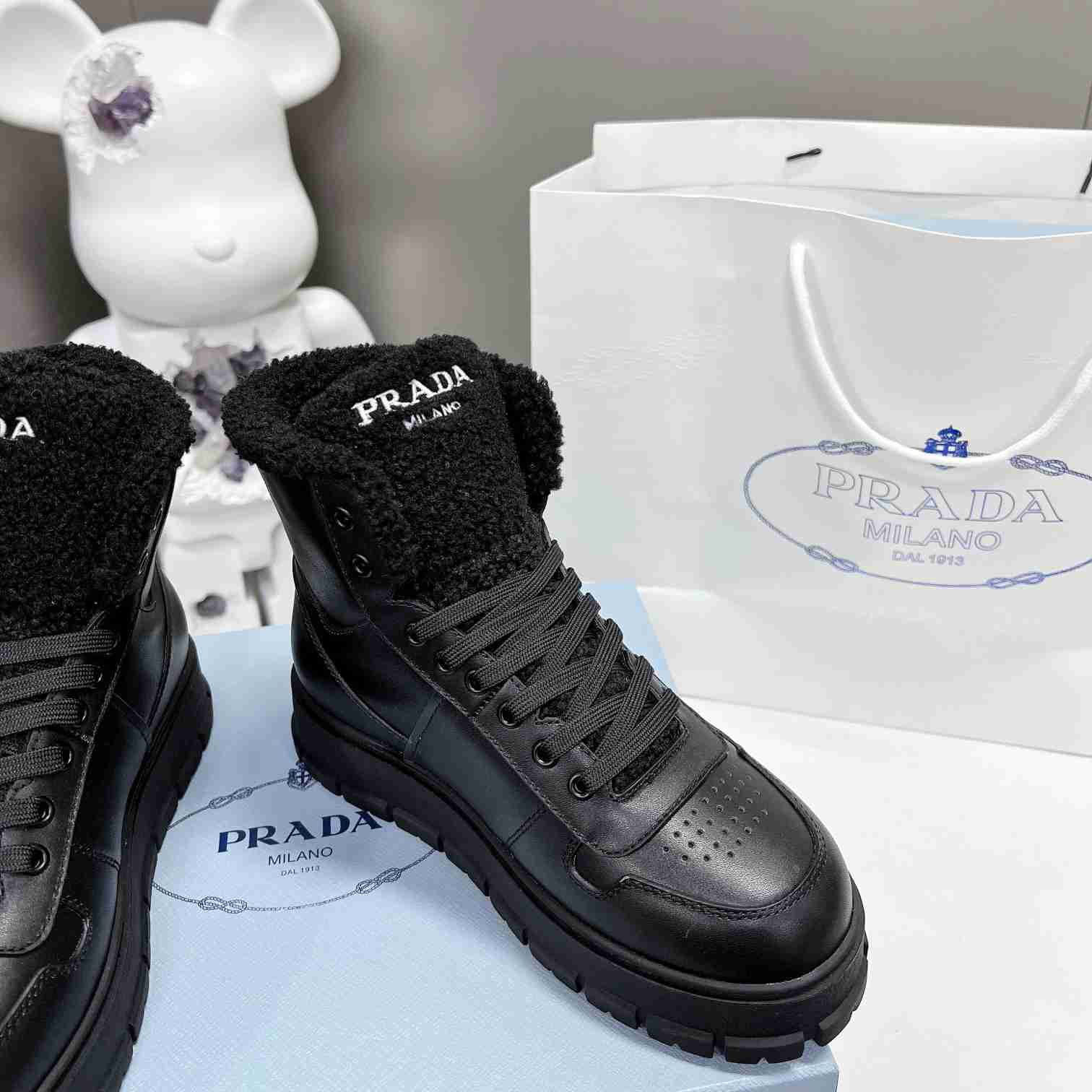 Prada Leather And Shearling High-top Sneakers - DesignerGu