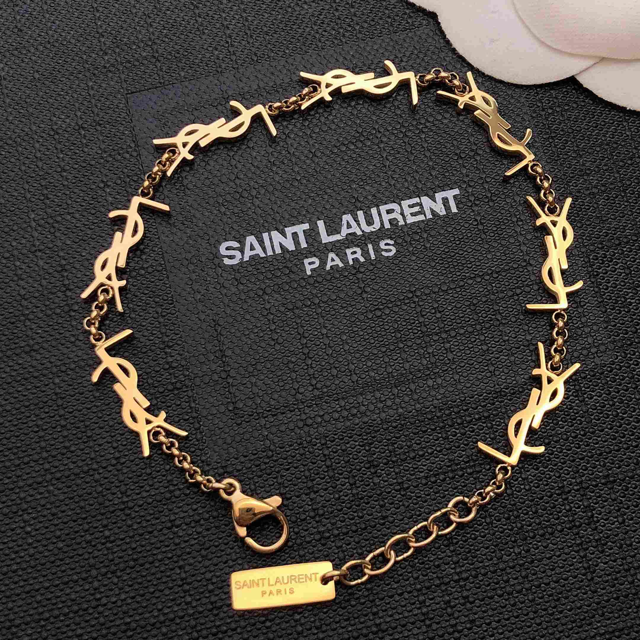 Saint Laurent Cassandre Multi-charm Bracelet In Metal - DesignerGu