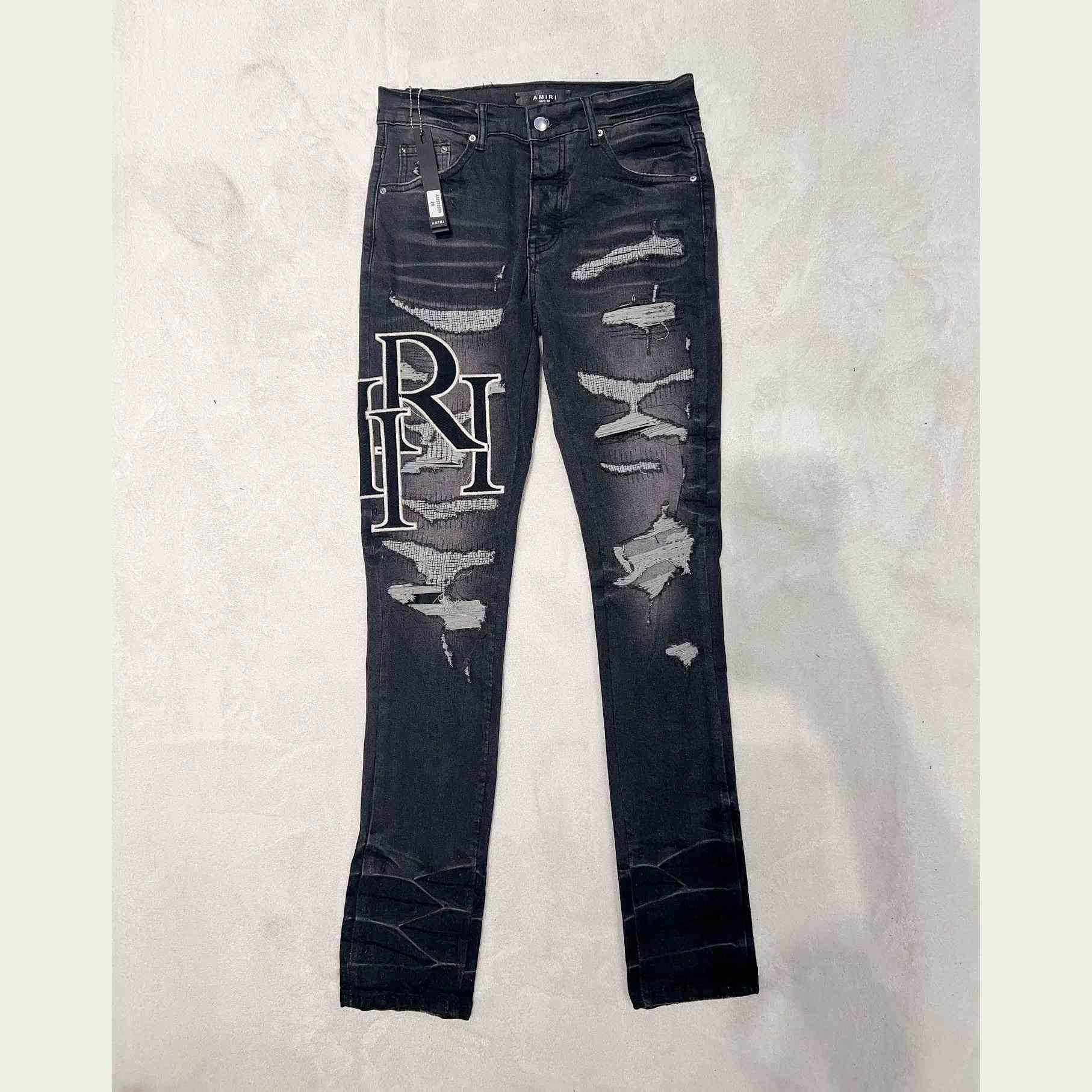 Amiri Staggered Jeans - DesignerGu