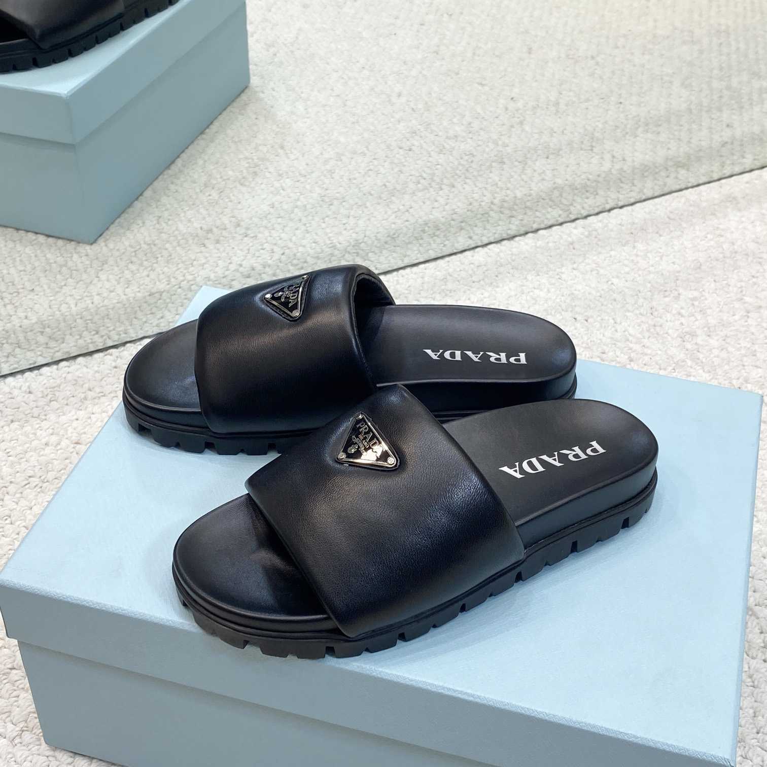 Prada Padded Nappa Leather Slides - DesignerGu