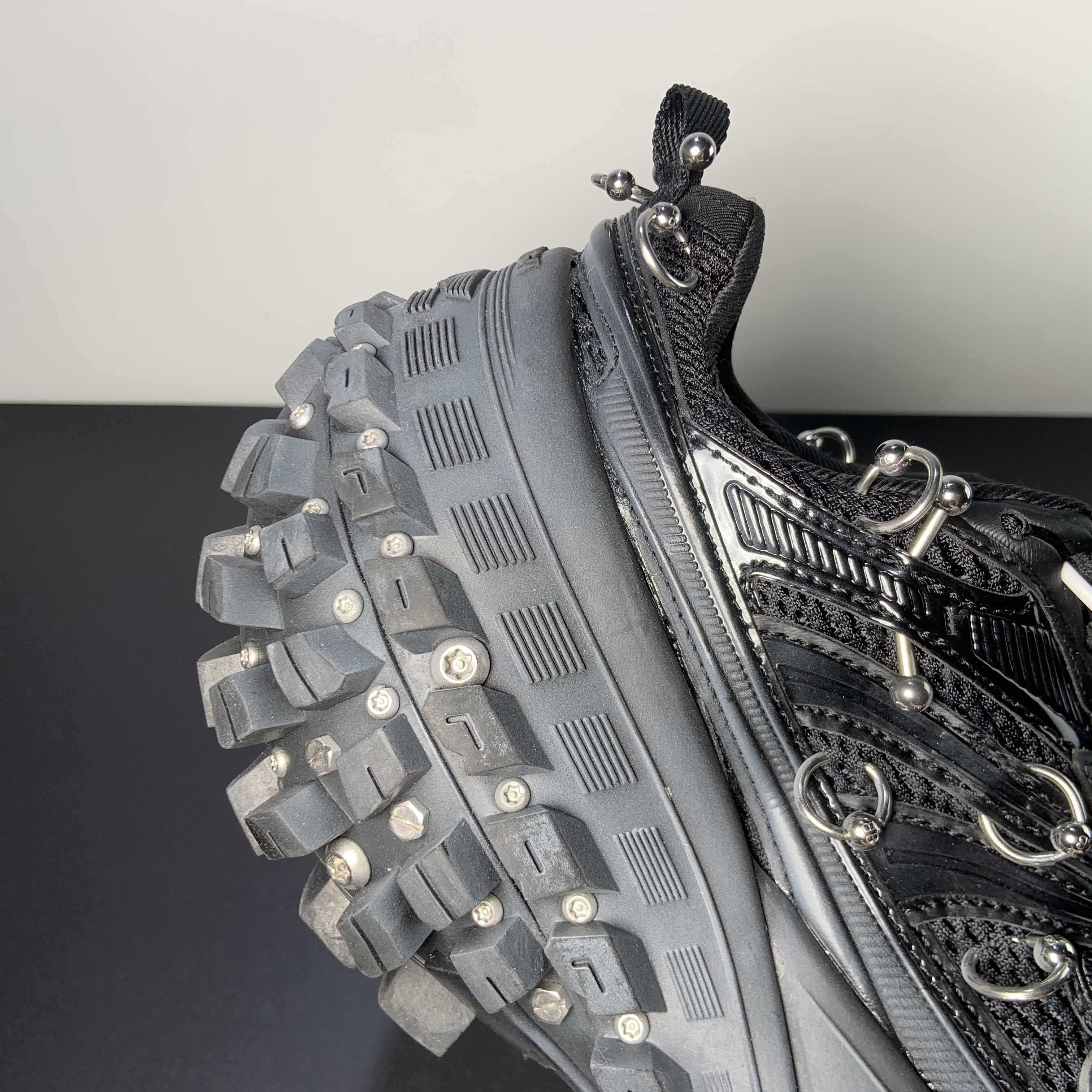 Balenciaga Bouncer Screw Sneaker With Piercings In Black - DesignerGu