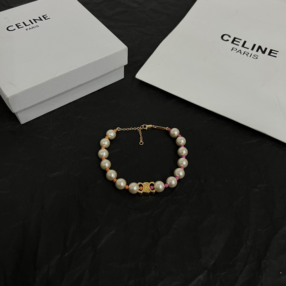 Celine Plage Pearl Bracelet In Brass With Gold Finish And Resin - DesignerGu