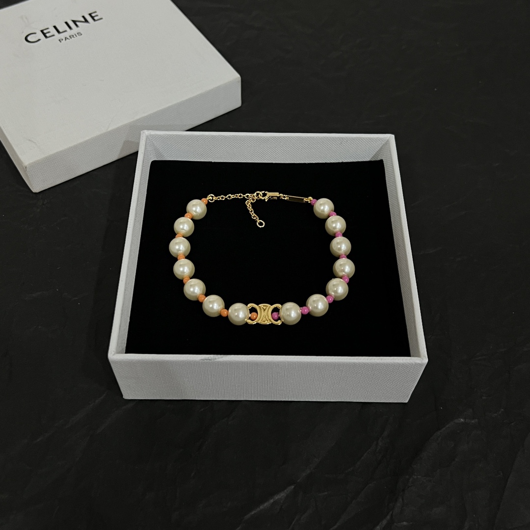 Celine Plage Pearl Bracelet In Brass With Gold Finish And Resin - DesignerGu