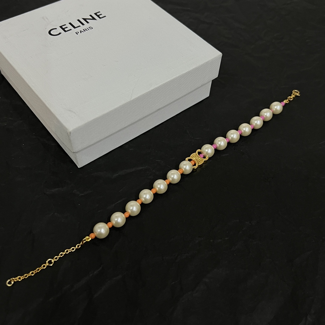 Celine Plage Pearl Bracelet In Brass With Gold Finish And Resin - DesignerGu