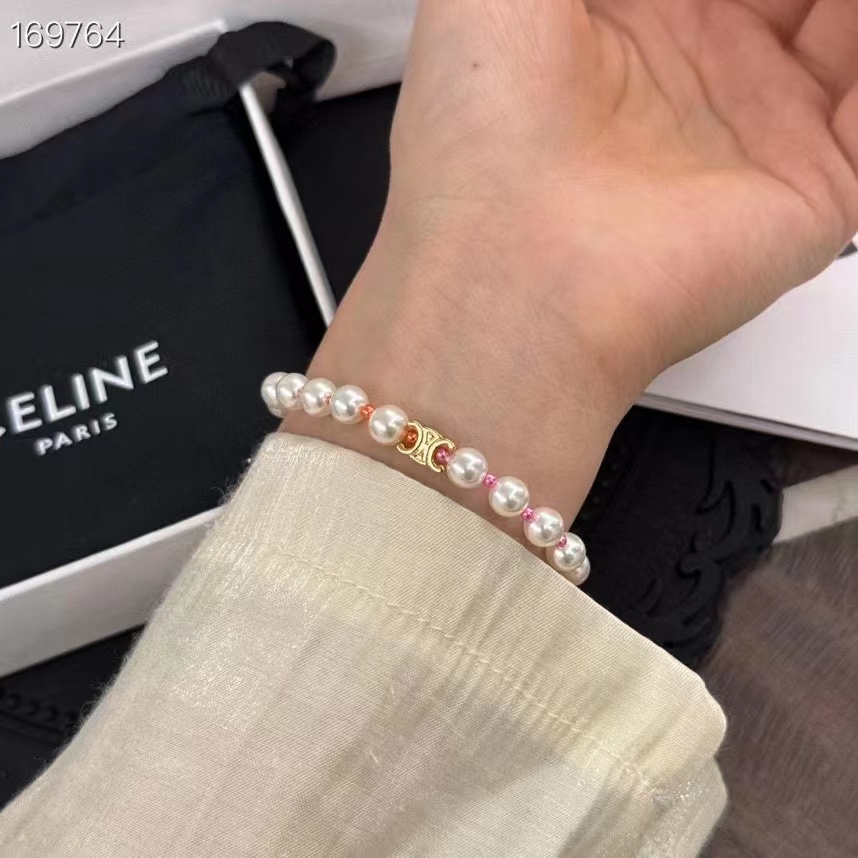 Celine Plage Pearl Bracelet In Brass With Gold Finish And Resin - DesignerGu