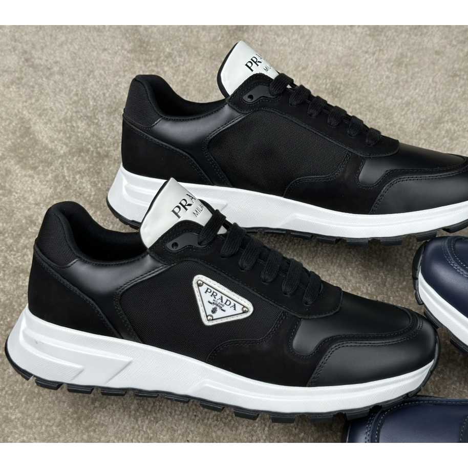 Prada Leather And Re-Nylon Sneakers - DesignerGu