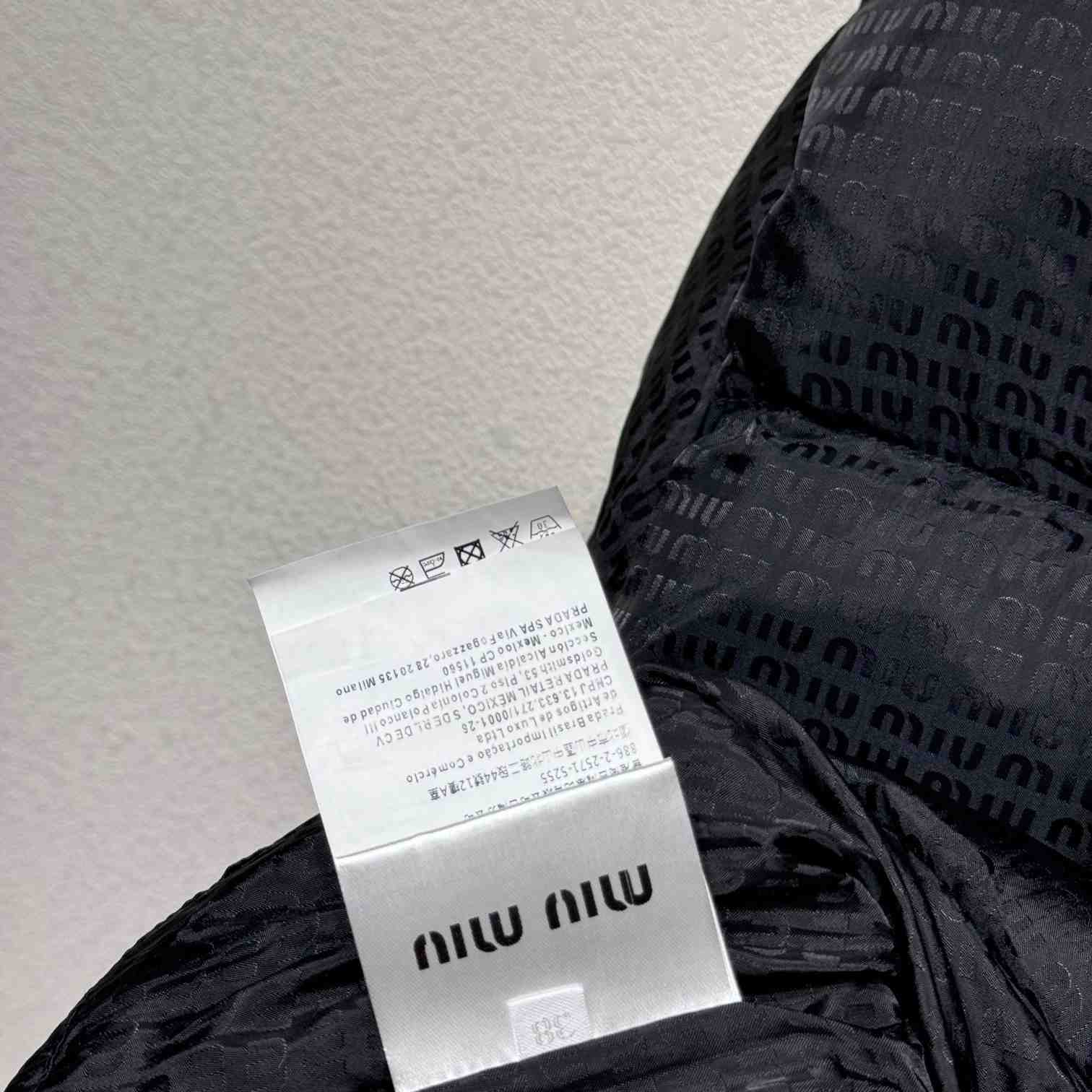 Miu Miu logo-appliqué puffer jacket  - DesignerGu