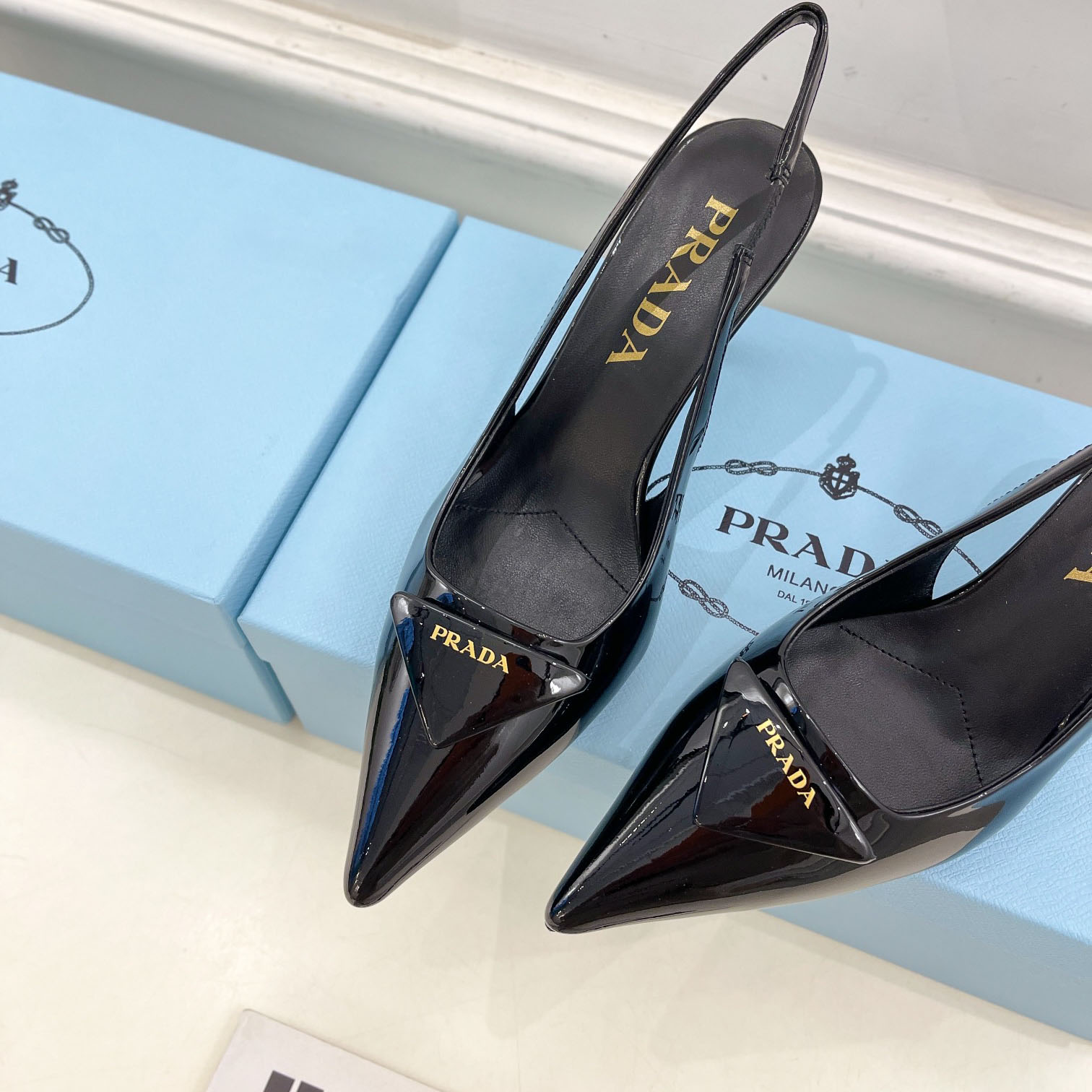 Prada 75m Patent Leather Slingback Pumps - DesignerGu