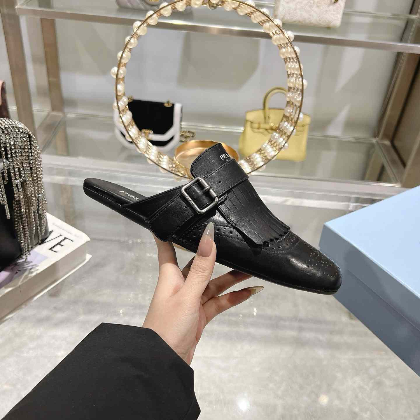 Prada Shuffle Fringed Monk Strap Leather Mules - DesignerGu