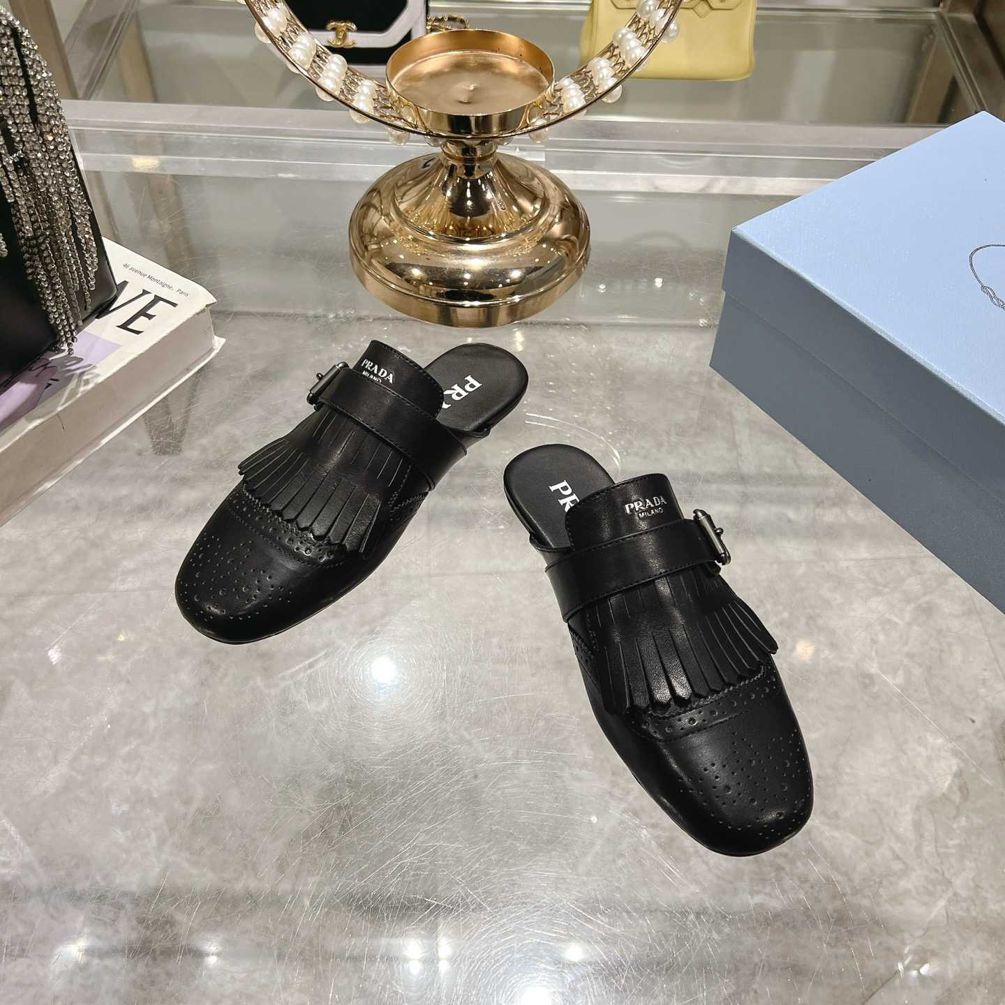 Prada Shuffle Fringed Monk Strap Leather Mules - DesignerGu